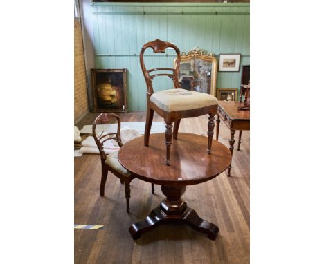 A 19th CENTURY CONTINENTAL MAHOGANY CIRCULAR TABLE raised on a hexagonal vase shaped column and tripartite base, 36 1/2" diam