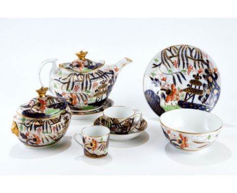 AN EARLY 19th CENTURY ENGLISH PORCELAIN IMARI PATTERN TEA SERVICE decorated with flowers and leaves comprising: teapot and st