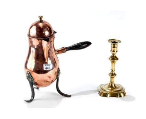 AN 18th CENTURY DUTCH COPPER CHOCOLATE POT of baluster form, turned side handle, raised on iron downswept legs, 11 1/4" high 