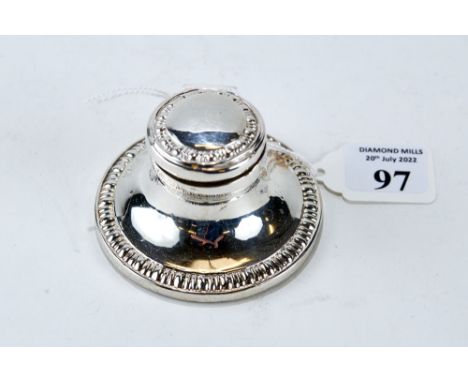 A GEORGE V CIRCULAR SILVER CAPSTAN INKWELL, hinged lid and beaded borders, maker: WJM &amp; Co, Birmingham 1911, 2 3/4" diame