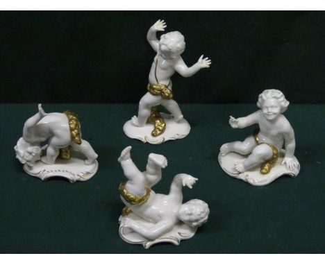 SET OF FOUR GERMAN/BAVARIAN STYLE GILDED CERAMIC FIGURES, POSSIBLY BY RUDOLF KAMMER 