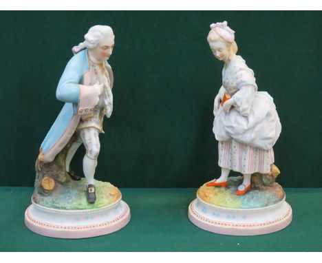 PAIR OF HANDPAINTED AND GILDED UNGLAZED BISQUE STYLE FIGURES, APPROXIMATELY 34cm HIGH 