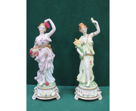 PAIR OF DRESDEN HANDPAINTED AND GILDED RELIEF DECORATED CERAMIC FIGURINES APPROXIMATELY 39cm HIGH 