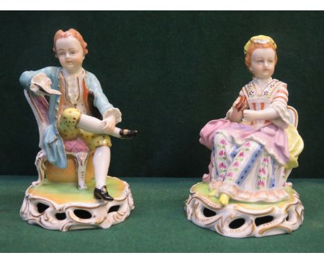 PAIR OF DRESDEN HANDPAINTED AND GILDED SEATED FIGURES ON PIERCEWORK SUPPORTS, APPROXIMATELY 15cm HIGH