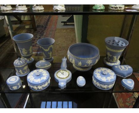 THIRTEEN PIECES OF WEDGWOOD BLUE JASPERWARE INCLUDING BAROMETER, SALAD BOWL, VASES, TRINKET BOXES, ETC. 