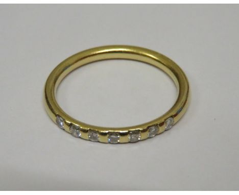 18ct YELLOW GOLD LADIES DRESS RING SET WITH SEVEN SMALL DIAMONDS 