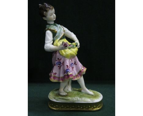 CONTINENTAL STYLE HANDPAINTED AND GILDED CERAMIC FIGURINE, APPROXIMATELY 17cm HIGH 