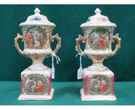 PAIR OF ROYAL VIENNA GILDED CERAMIC ENAMELLED URNS WITH COVERS, APPROXIMATELY 22cm HIGH 