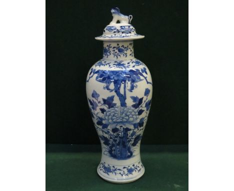 ORIGINAL STYLE BLUE AND WHITE GLAZED CERAMIC STORAGE JAR AND COVER, STAMPED WITH SYMBOLS TO BASE (AT FAULT), APPROXIMATELY 38
