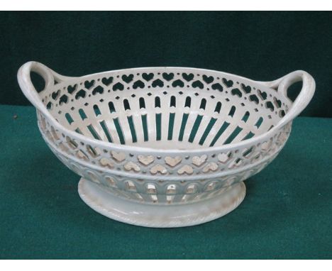 ANTIQUE PIERCEWORK DECORATED GLAZED TWO HANDLED CERAMIC BOWL, POSSIBLY LEEDSWARE, STAMPED PW TO BASE 