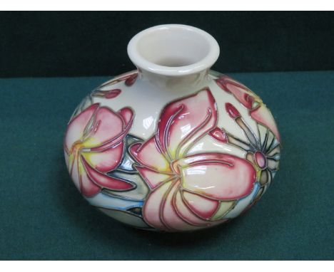 MOORCROFT CERAMIC JUG WITH TUBE LINED FLORAL DECORATION, INITIALLED WM AND DATED 1999, APPROXIMATELY 13cm HIGH 
