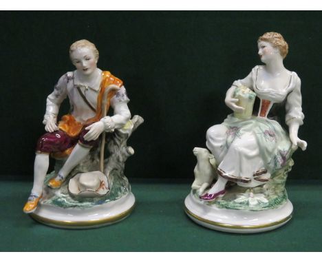 CONTINENTAL STYLE HANDPAINTED AND GILDED CERAMIC SEATED FIGURES, APPROXIMATELY 21cm HIGH 