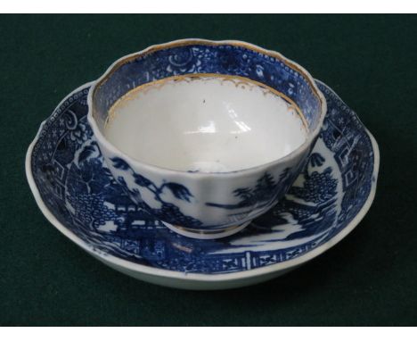 SALOPIAN POTTERY BLUE AND WHITE CERAMIC TEA BOWL AND SAUCER 