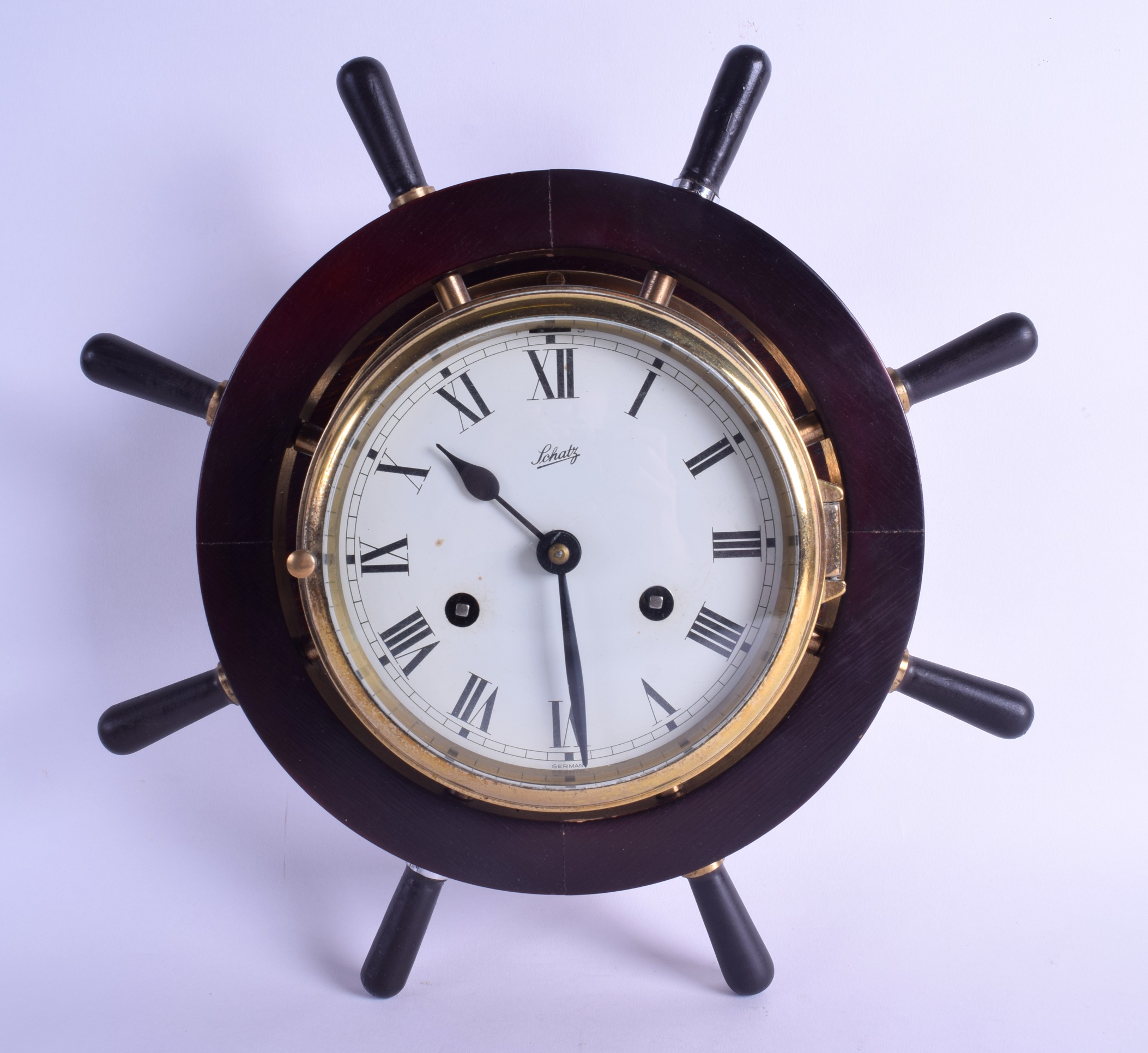 A SCHATZ BRASS BOUND MARITIME INSPIRED SHIPS CLOCK with steering
