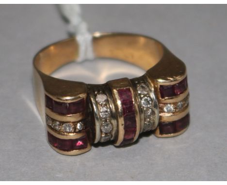 A 1940's gold, ruby and diamond set cocktail ring, size P.