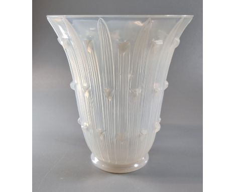 Rene Lalique ‘Bellis’ vase, no. 1097, designed in 1926. Opalescent vase, mould blown with vertical out-turned leaf motif, etc