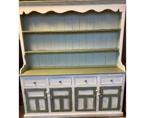 19th century painted pine two stage dresser, the moulded cornice above boarded rack with two fitted shelves, the projecting s