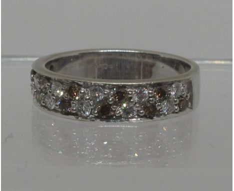 Diamond half eternity style ring of white and champagne coloured diamonds set in 9ct white gold.  Ring size N.  Approx weight