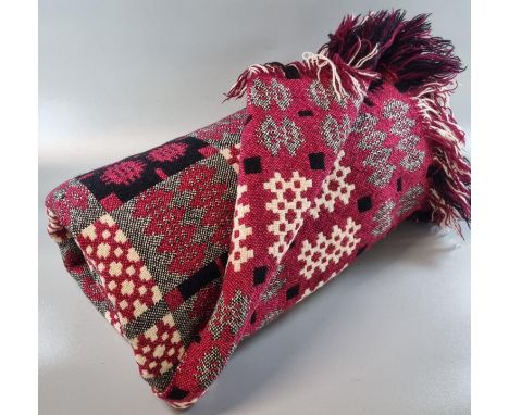 Vintage woollen Welsh tapestry blanket or carthen in red, black and cream, traditional Caernarfon design, with a 'Derw produc