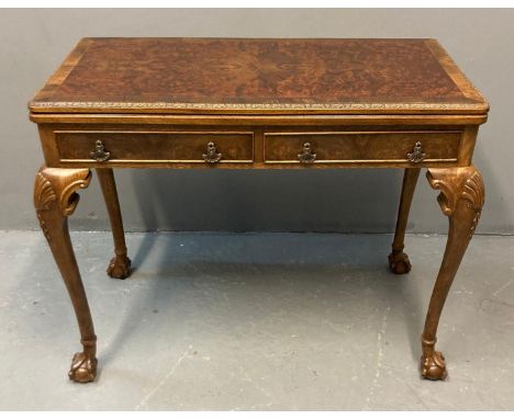 Georgian style walnut fold over card table, the moulded top with hinged lid and green baize above two cock beaded drawers wit