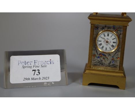 Miniature gilt brass carriage clock with silvered and enamelled face and side panels decorated with birds amongst foliage and