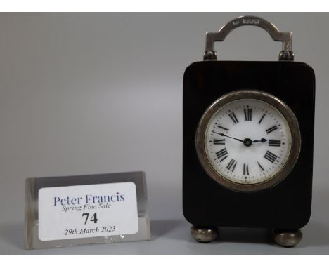19th century French tortoiseshell silver mounted boudoir/carriage clock having circular white roman face, silver handle and b