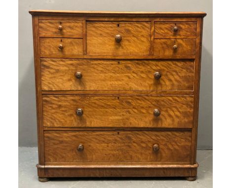 19th century satin wood and mahogany straight front Scotch chest of drawers, the moulded shaped top above a hat box drawer fl