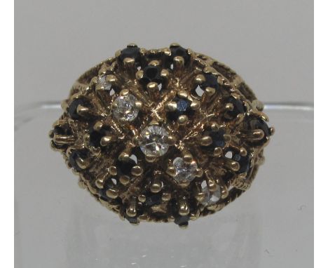 9ct gold diamond and sapphire ring.  Ring size Q&1/2.  Approx weight 8 grams.(B.P. 21% + VAT) 