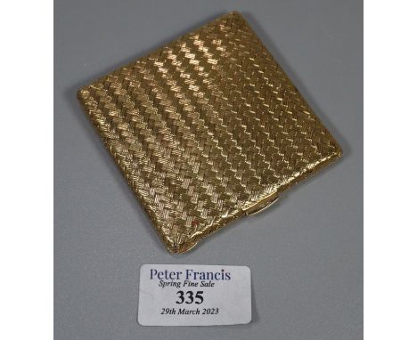 An 18ct gold powder compact with woven detail.  Stamped 750 and engraved with an inscription to the interior. 7cmx7cm.  Appro