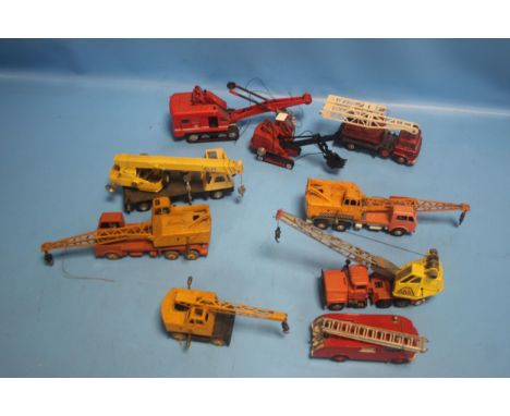EIGHT UNBOXED DIE CAST LORRY MOUNTED CRANES, four of which are Dinky together with a Dinky 955 fire engine