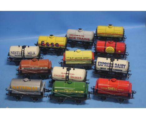 TWELVE UNBOXED O' GAUGE TANKER WAGONS BY ACE TRAINS