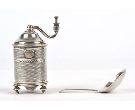 Engine turned French silver pepper mill and a caddy spoon by Thomas Wallis II, London 1795