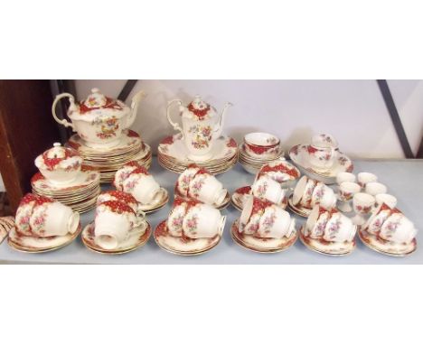 A Paragon 'Rockingham' comprehensive service including: six dinner plates, one cake plate, seven side plates, twelve tea plat