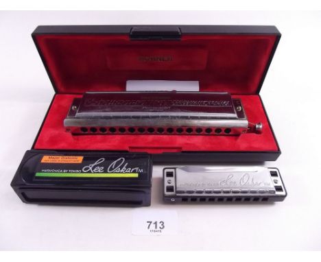 A Hohner Chromonica 280 and a small harmonica 