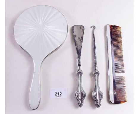 A silver and white enamel five piece dressing table set comprising mirror, comb, three brushes &nbsp;London 1900 and a silver