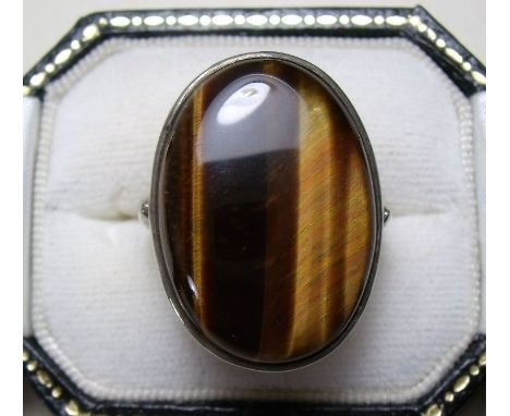 A silver tigers eye ring