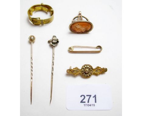 A group of antique gold and yellow metal jewellery including fob and stick pins