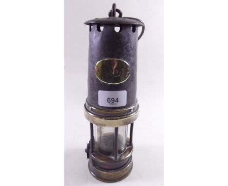 An old miners lamp No.110 by Peterson Lamps