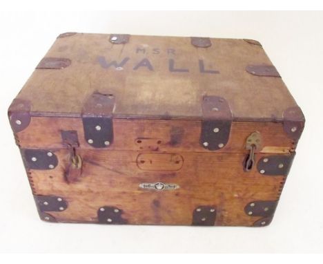 A small metal bound pine trunk