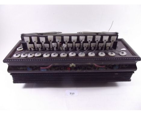 A19th century rosewood and brass inlaid accordion with mop keys 