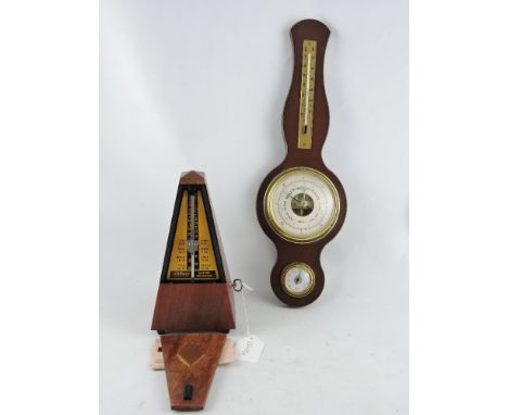 A Wittner Series 800/810 wind-up metronome, together with a barometer (2)