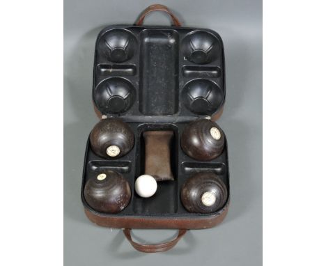 A vintage Jaques bowls set, with jack and measuring acoutrements, in original carry case