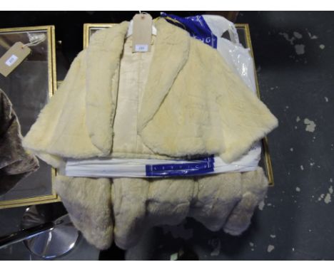 A vintage fur bolero, retailed by Selfridges