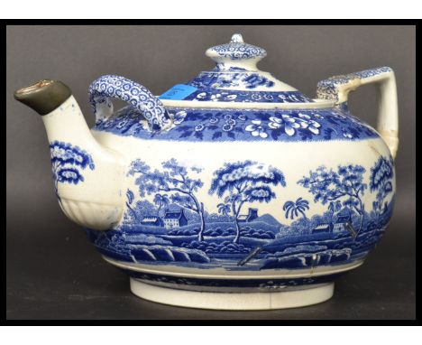 A 19th century ceramic blue and white oversized eight pint teapot by Copeland, transfer printed with Copeland Spode Tower Eng