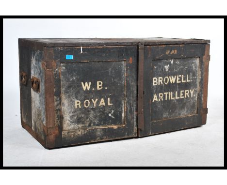 A rare 19th century campaign chest of drawers travel trunk case. The ebonised pine section box with twin doors having notatio