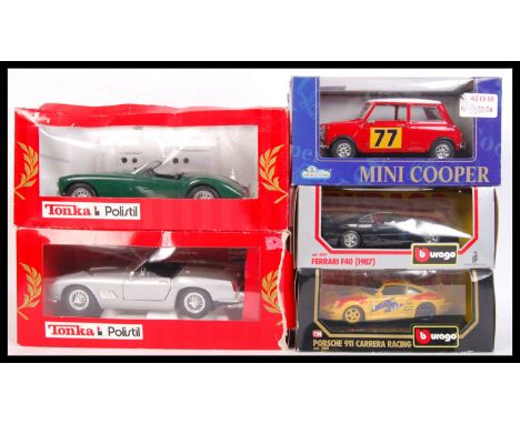 A collection of 5x 1:24 &amp; 1:16 scale various branded diecast model vehicle to include; Burago 1560 Porsche 911 &amp; 0532