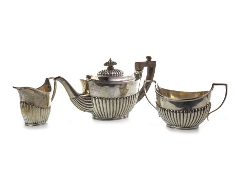 VICTORIAN SILVER THREE PIECE TEA SERVICE, maker Charles Stuart Harris, London 1896, comprising tea pot, sugar and cream, 590g