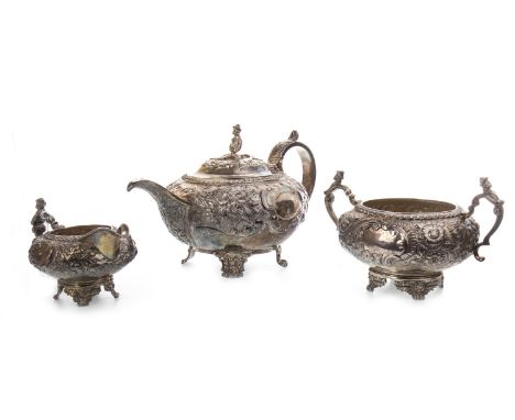 GEORGIAN SILVER TEA SERVICE, maker Hyam Hyams, London 1822-23, of squat circular form, comprising tea pot, sugar and cream, r