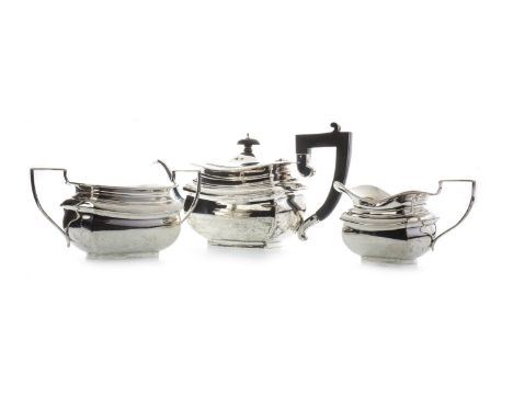 GEORGE V SILVER THREE PIECE TEA SERVICE, maker I M Hutchfield, Birmingham 1919, of shaped rectangular form, comprising tea po