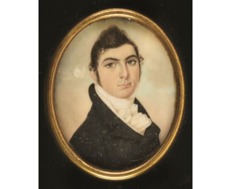 * Attributed to John Turmeau (1777-1846). Portrait of a young gentleman, watercolour and gouache on ivory, oval head &amp; sh